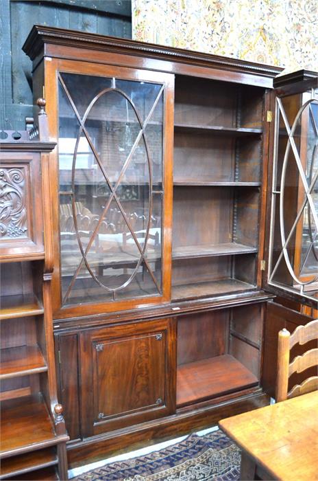 A Victorian mahogany library bookcase with a dentil moulded cornice over a pair of ovoid centred - Image 2 of 3