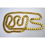 A yellow metal fancy linked necklace, stamped K18, approx 43gNo repairs, 81 cm long