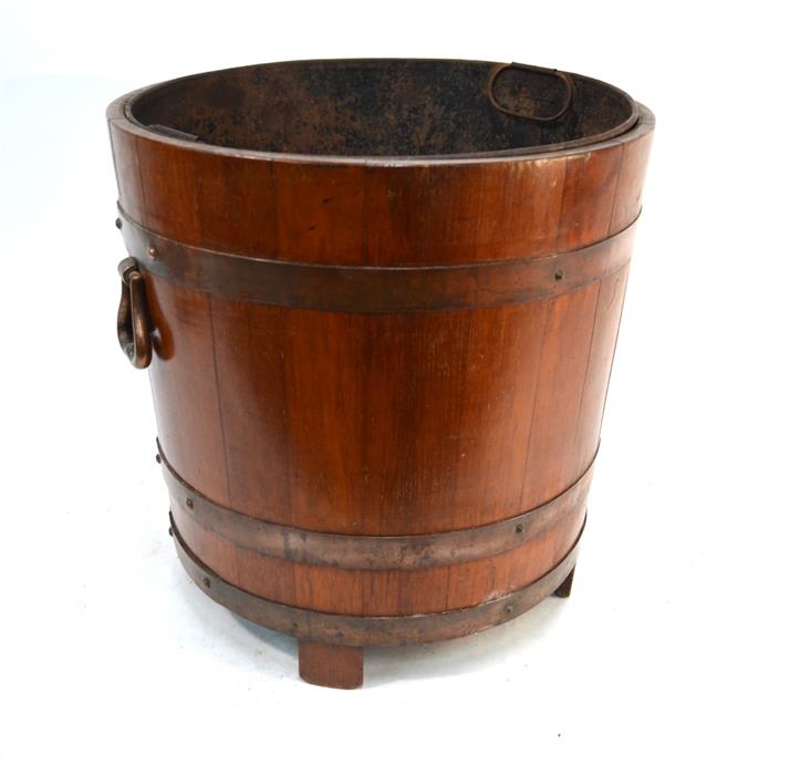 A large copper bound coopered log bucket with tin liner, two handles and four stave feet, 45 cm diam - Image 3 of 4