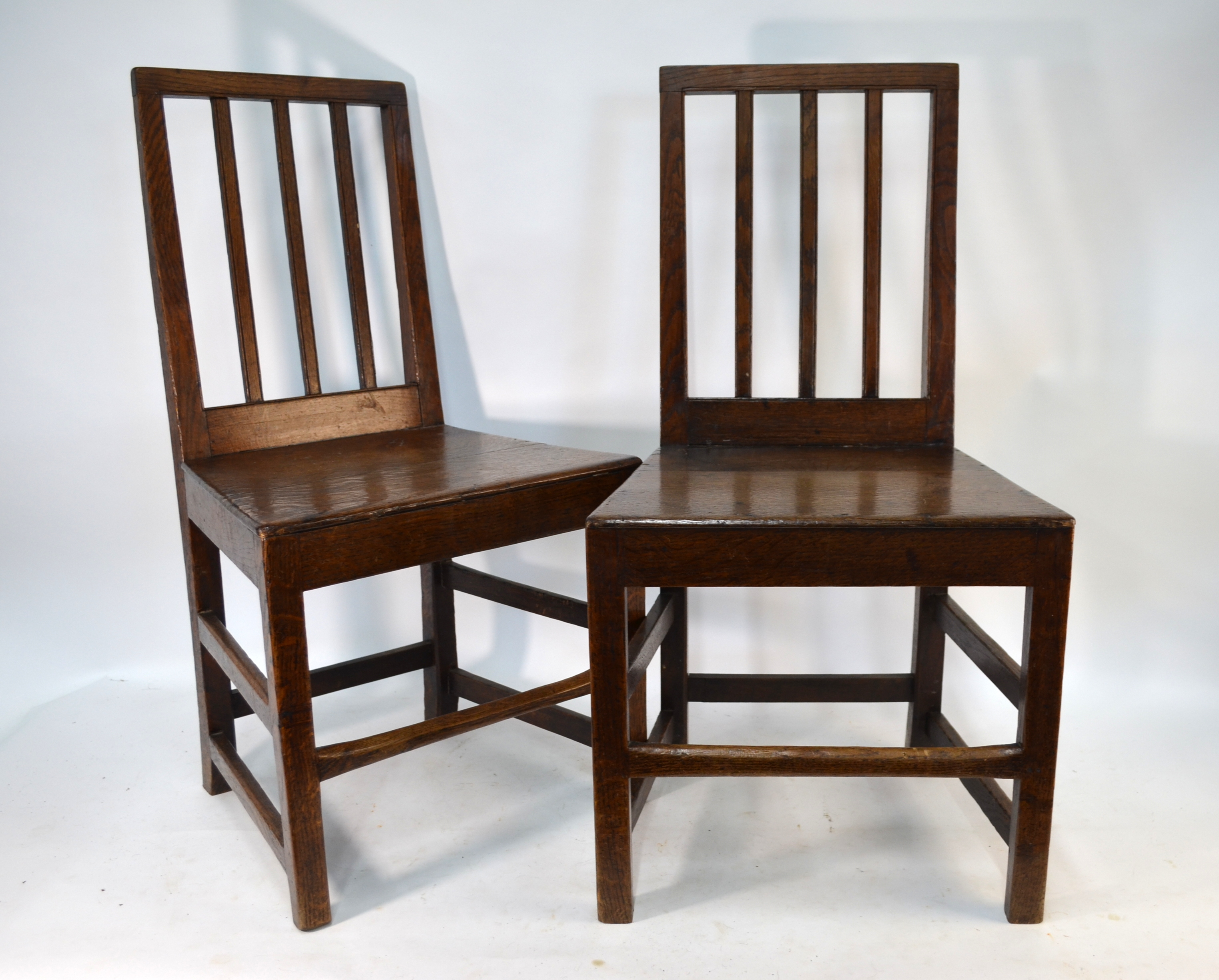 A set of six 18th/19th century oak country side chairs with plank seats (6)