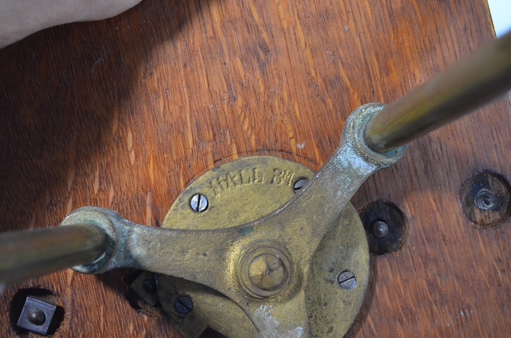 An early 20th century brass and oak revolving magazine-stand on tripod base - Image 6 of 6