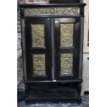 A late 17th/18th century and later jointed cabinet mounted with classical Bacchanalian style brass
