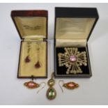 A collection of vintage and antique jewellery including an early 19th century brooch formed of a