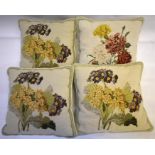 Four, 34 cm square floral wool tapestry cushions with velvet backing (4)