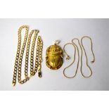 A yellow metal large scarab pendant, 4.5 x 3 cm to/w yellow metal flat belcher chain and fine rope-