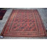 An Ersari carpet, circa 1880, the repeating geometric patterns on red ground, 275 x 243 cm [234]