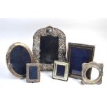 An Art Nouveau style silver-faced photograph frame, Birmingham 1994, to/w five other small silver-