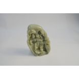 A modern green jade, Chinese boulder carved as the famous Jin Dynasty Calligrapher, Wang Xi Zhi,