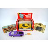 A Telsalda Toys (Hong Kong) friction drive Iso Grifo 7 litre (purple / black bonnet) boxed to/w a