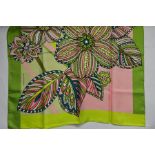 An Egon Von Furstenberg silk scarf with bold flower print in vibrant green/pink/turquoise, a silk