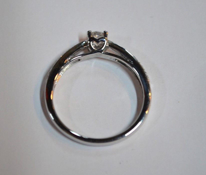 A contemporary 9ct white gold diamond ring, the central circular brilliant cut claw set diamond with - Image 5 of 6