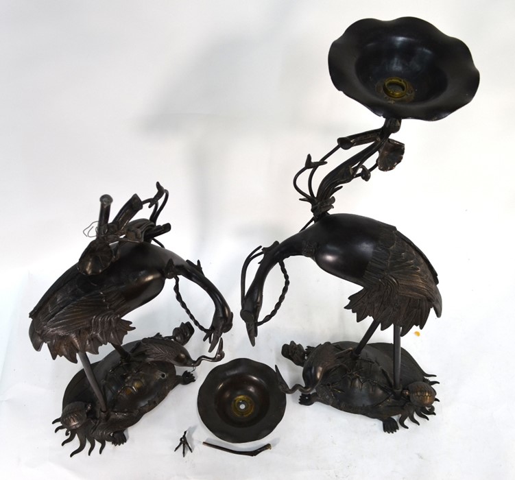 A pair of Japanese metal alloy figures of Manchurian tsuru; each bird standing on a minogame - Image 2 of 2