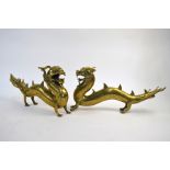 A pair of Asian brass sculpture, designed as dragons, 35 cm long (2)