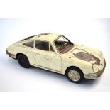 Yanoman, Japan, a 1960's large scale tin plate Porsche 911S, 39 cm long, playworn, part stripped and