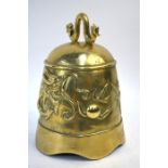 A Korean, or other Asian, metal bell; the bell decorated with a dragon and flaming pearlSome wear,