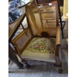 Mahogany bergere chair with floral tapestry seat