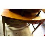 A Victorian style mahogany bowfront three drawer side table