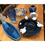 A collection of Studio wares including a blue bowl adorned with white doves on the rim, Lamorna