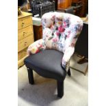 Floral upholstered button back arm chair c/w loose cover