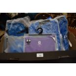 A box containing Proquip gentlemen's Elite Wind 360 jackets, Footjoy purple base layer and other