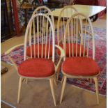 An Ercol Windsor Quaker spindle back ash carver chair with steam bent rail and sculpted seat to/with