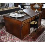A Victorian mahogany twin pedestal partners desk, the top with inset faux leather surface, with rise