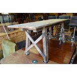 Vintage rustic pine and iron mounted trestle table
