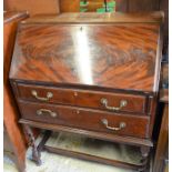 Mahogany fall front bureau with fitted interior over two drawers raised on barley twist supports