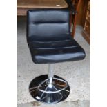 Three modern leatherette and chromed adjustable bar stools