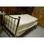 A pair of late 19th/20th century single brass bedsteads to/w pocket sprung mattresses (2)