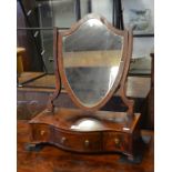 19th century shield shaped toilet mirror on serpentine front three drawer platform base (A/F)