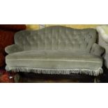 Two seater salon settee with green dralon button back upholstery, raised on carved and shaped legs