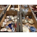Two boxes of assorted china and glass including paperweights and a silver plated chamber stick and