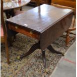 19th century mahogany drop leaf table with frieze drawer and opposing dummy drawer, turned column