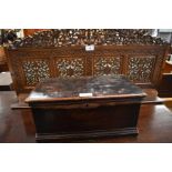 A foliate carved oak bookshelf, to/w an oak jewellery box with lift-out tray (2)