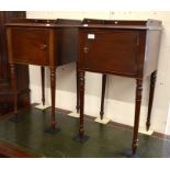 Pair of mahogany bedside cabinets each with a single panelled cupboard door raised on turned