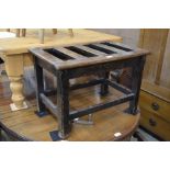 Early 20th century stained oak luggage stand