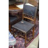 A set of six 6 antique French walnut framed side chairs, with brass studded embossed leather back