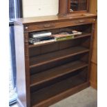 Early 20th century carved oak open bookcase with five adjustable shelves raised on a plinth base