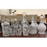 A 19th century engraved wine carafe, two hobnail cut liqueur decanters, six Italian engraved glass