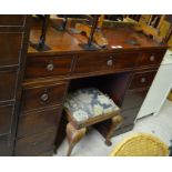 A Victorian mahogany twin pedestal seven drawer sideboard