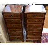 Pair of mahogany six drawers chests raised on bracket feet