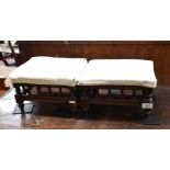Pair of mahogany rectangular coach stools, cream upholstery