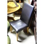 A set of four brown leather beech framed chairs (4)