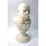 A resin bust of Winston Churchill, 32 cm high