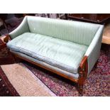 A contemporary Victorian style pale green upholstered bench sofa raised on turned hardwood front