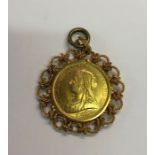 A Victorian gold £5 coin dated 1893 in fancy rope twist mount, approx 58.3g including brass