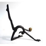 Stanley Dove (b.1931) - Female nude acrobat with ball, dark patinated bronze, 27 x 28 cm, signed '