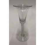 A Georgian wine glass, bell bowl, multi spiral air twist stem continuing into base of bowl,