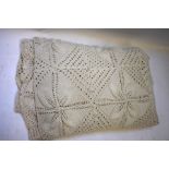 A vintage hand-knitted heavy cotton bedcover with flower motif, 278 x 340 cm